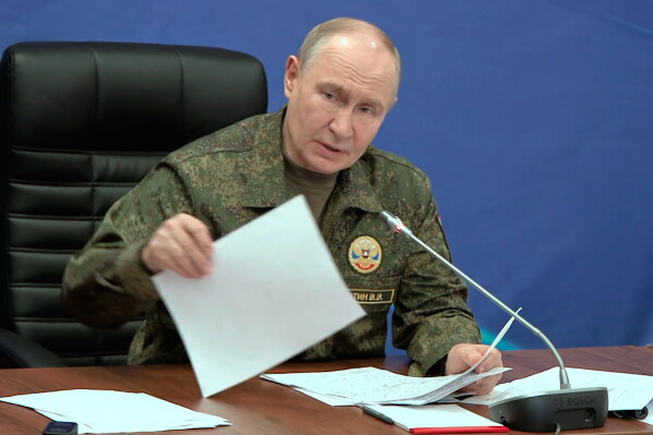 In this image taken from video provided by Russian Presidential Press Service on Friday, July 3, 2026, Russian President Vladimir Putin while visiting one of the command posts of the Joint Group of the Russian Forces, in an undisclosed location. (Russian Presidential Press Service via AP)