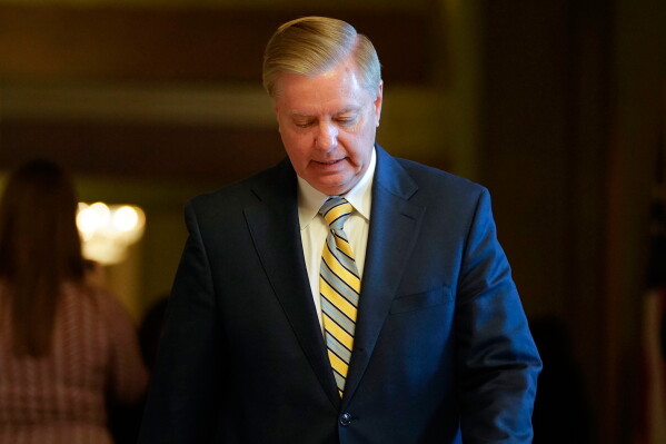 Sen. Lindsey Graham, R-S.C., leaves a meeting in the office of Senate Majority Leader Mitch McConnell, R-Ky., at the Capitol in Washington, Nov. 13, 2018. (AP Photo/Pablo Martinez Monsivais, File)
