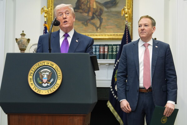 President Donald Trump, left, speaks during an event with Environmental Protection Agency director Lee Zeldin in the Roosevelt Room of the White House, Feb. 12, 2026, in Washington. (AP Photo/Evan Vucci, File)