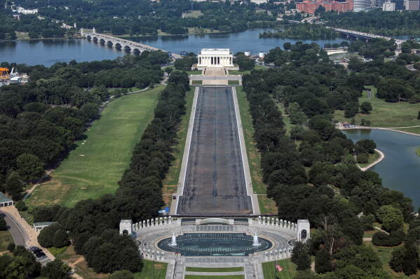 The Lincoln Memorial and the Reflecting Pool are seen from the Washington Monument, Wednesday, July 15, 2026, in Washington. (AP Photo/Rahmat Gul)