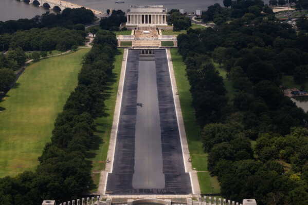 The drained Lincoln Memorial Reflecting Pool is photographed from the Washington Monument, Wednesday, Aug. 5, 2026, in Washington. (AP Photo/Tierney L. Cross)