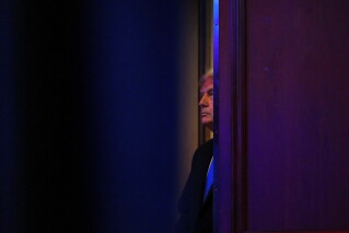 President Donald Trump stands before speaking at the Faith & Freedom Coalition's policy conference at the Washington Hilton, Friday, June 26, 2026, in Washington. (AP Photo/Julia Demaree Nikhinson)