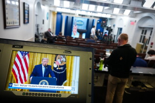 President Donald Trump is seen speaking from the East Room of the White House on a television screen in the James Brady Press Briefing Room of the White House, Thursday, July 16, 2026, in Washington. (AP Photo/Julia Demaree Nikhinson)