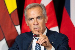Prime Minister Mark Carney speaks to reporters during the closing news conference at the First Ministers Meetings in Charlottetown, Prince Edward Island, Canada, on Thursday, July 23, 2026. (Darren Calabrese/The Canadian Press via AP)