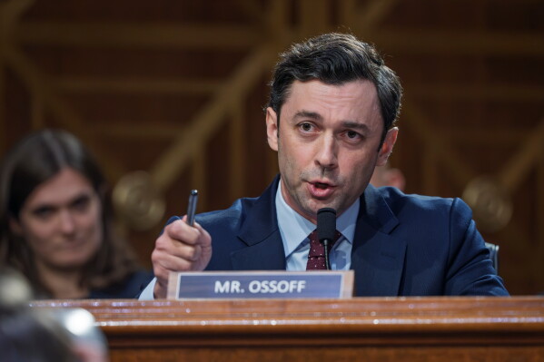 Sen. Jon Ossoff, D-Ga., questions Jay Clayton, President Donald Trump's pick to head the nation's intelligence agencies, as he appears for his confirmation hearing before the Senate Intelligence Committee, at the Capitol in Washington, Wednesday, July 15, 2026. (AP Photo/J. Scott Applewhite)