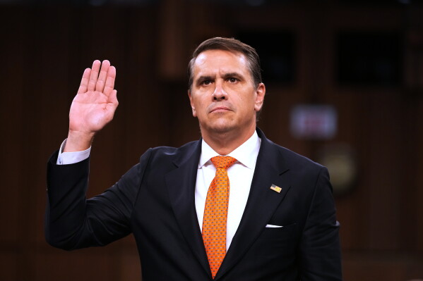 Acting Attorney General Todd Blanche is sworn in as he appears before the Senate Judiciary Committee on Capitol Hill in Washington, July 15, 2026. (AP Photo/Mark Schiefelbein, File)