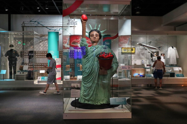 People views displays at the Smithsonian museum a day after Independence Day celebrations honoring the nation's 250th anniversary on the National Mall in Washington, Sunday, July 5, 2026. (AP Photo/Rahmat Gul)