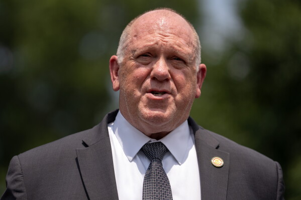 White House border czar Tom Homan speaks with reporters outside the White House, Monday, July 20, 2026, in Washington. (AP Photo/Mark Schiefelbein)