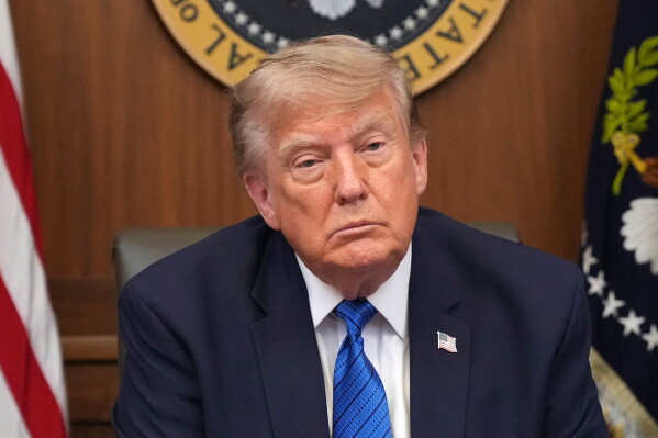 President Donald Trump listens during a cabinet meeting, Friday, July 31, 2026, at Camp David, the presidential retreat, near Thurmont, Md., Friday, July 31, 2026. (AP Photo/Jacquelyn Martin)