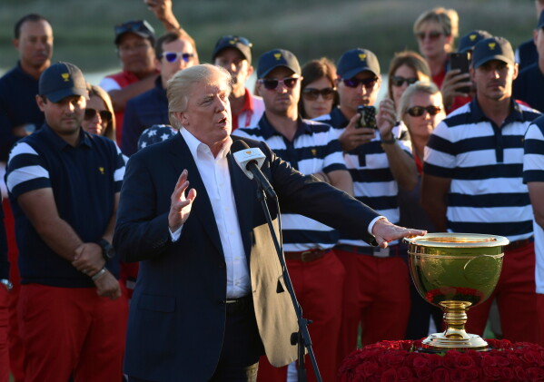 President Donald Trump speaks before presenting the winner's trophy to the U.S. Team after the final round of the Presidents Cup at Liberty National Golf Club in Jersey City, N.J., Sunday, Oct. 1, 2017. (AP Photo/Susan Walsh,File)