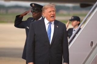 President Donald Trump speaks after arriving on Air Force One, Friday, Aug. 28, 2026, at Joint Base Andrews, Md. (AP Photo/Mark Schiefelbein)