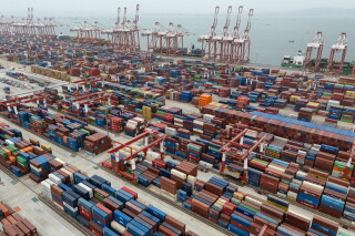 Shipping containers are seen ready for transport at the Guangzhou Port in the Nansha district in southern China's Guangdong province, April 17, 2025. (AP Photo/Ng Han Guan, File)